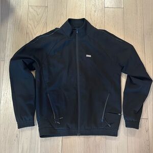 Black FIGS Windbreaker style jacket